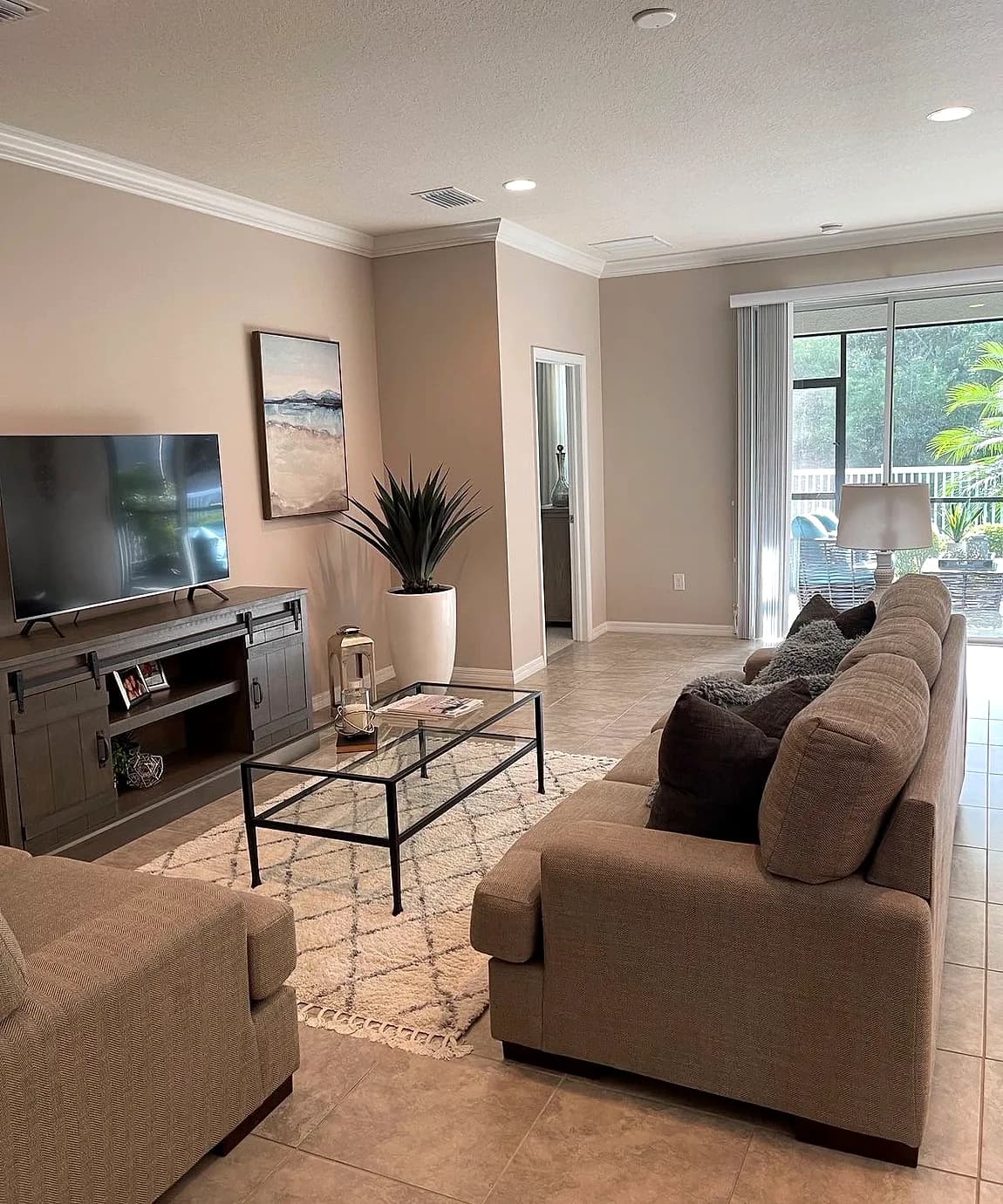 A cozy, guest-ready staged living room for a short-term rental
